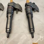 Set of 6 2017 Paccar MX13 Diesel Engine Fuel Injectors 2047600 OEM w/ Hold Downs - 1710$ Picture 1 of 7 Picture 2 of 7 Picture 3 of 7 Picture 4 of 7 Picture 5 of 7 Picture 6 of 7 Picture 7 of 7 Picture 1 of 7 Picture 2 of 7 Picture 3 of 7 Picture 4 of 7 Picture 5 of 7