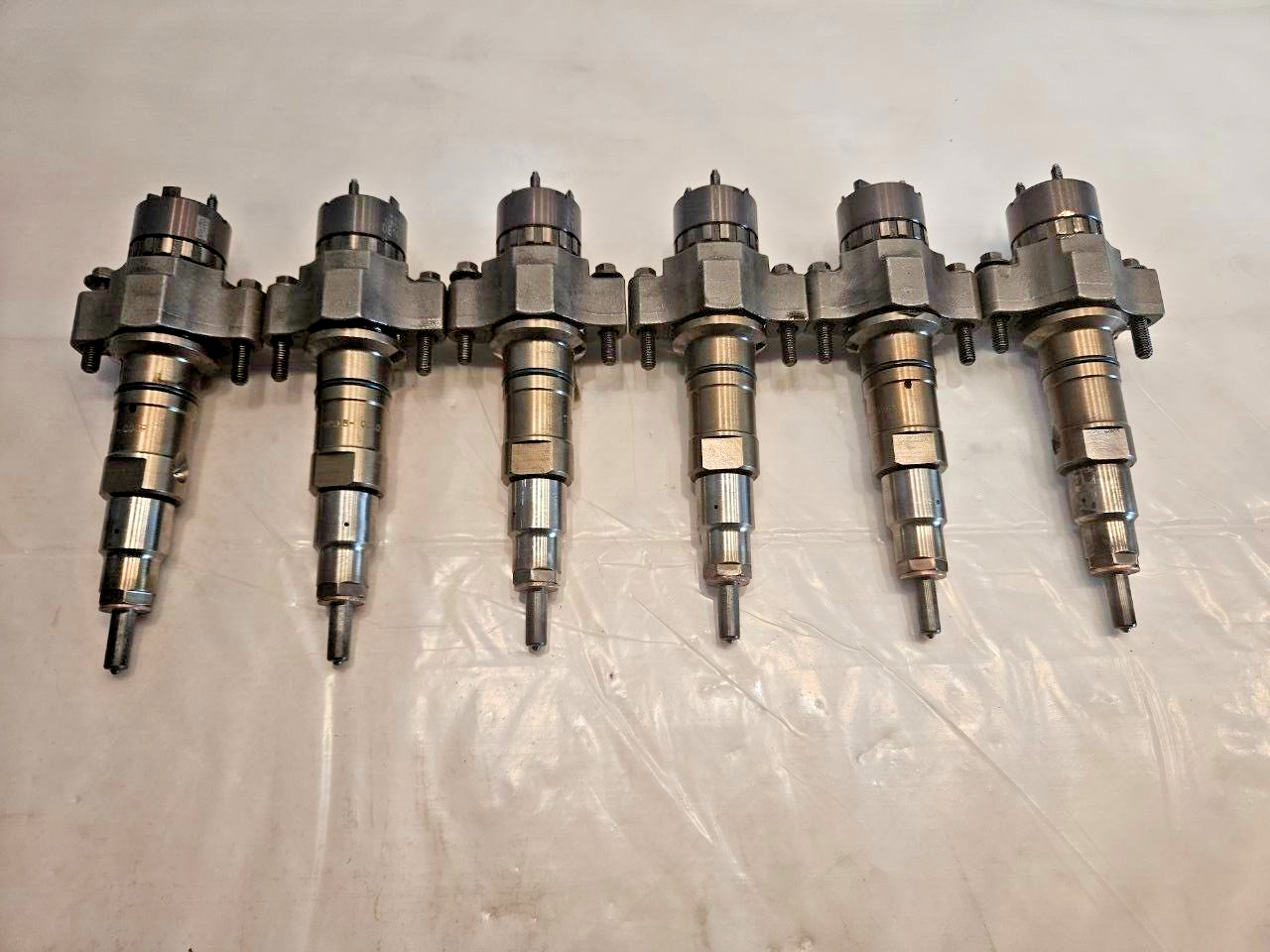 Set of 6 Cummins 8.9L ISC/ISL Diesel Engine CR Fuel Injectors 4954927 OEM