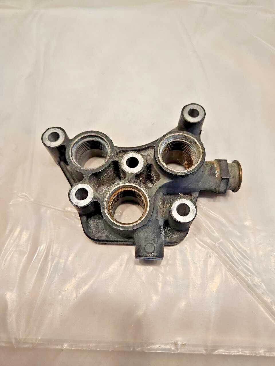 Paccar MX13 diesel engine fuel diverter housing 1889326 OEM