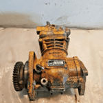CAT C15 DIESEL ENGINE AIR BRAKE COMPRESSOR 223-3637 BENDIX 5011427 -  Picture 1 of 5 Picture 2 of 5 Picture 3 of 5 Picture 4 of 5 Picture 5 of 5 Picture 1 of 5